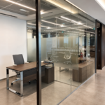 Office glass partition Dubai with black framed glass walls
