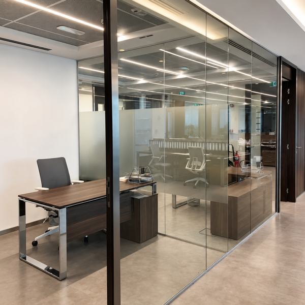 Office glass partition Dubai with black framed glass walls