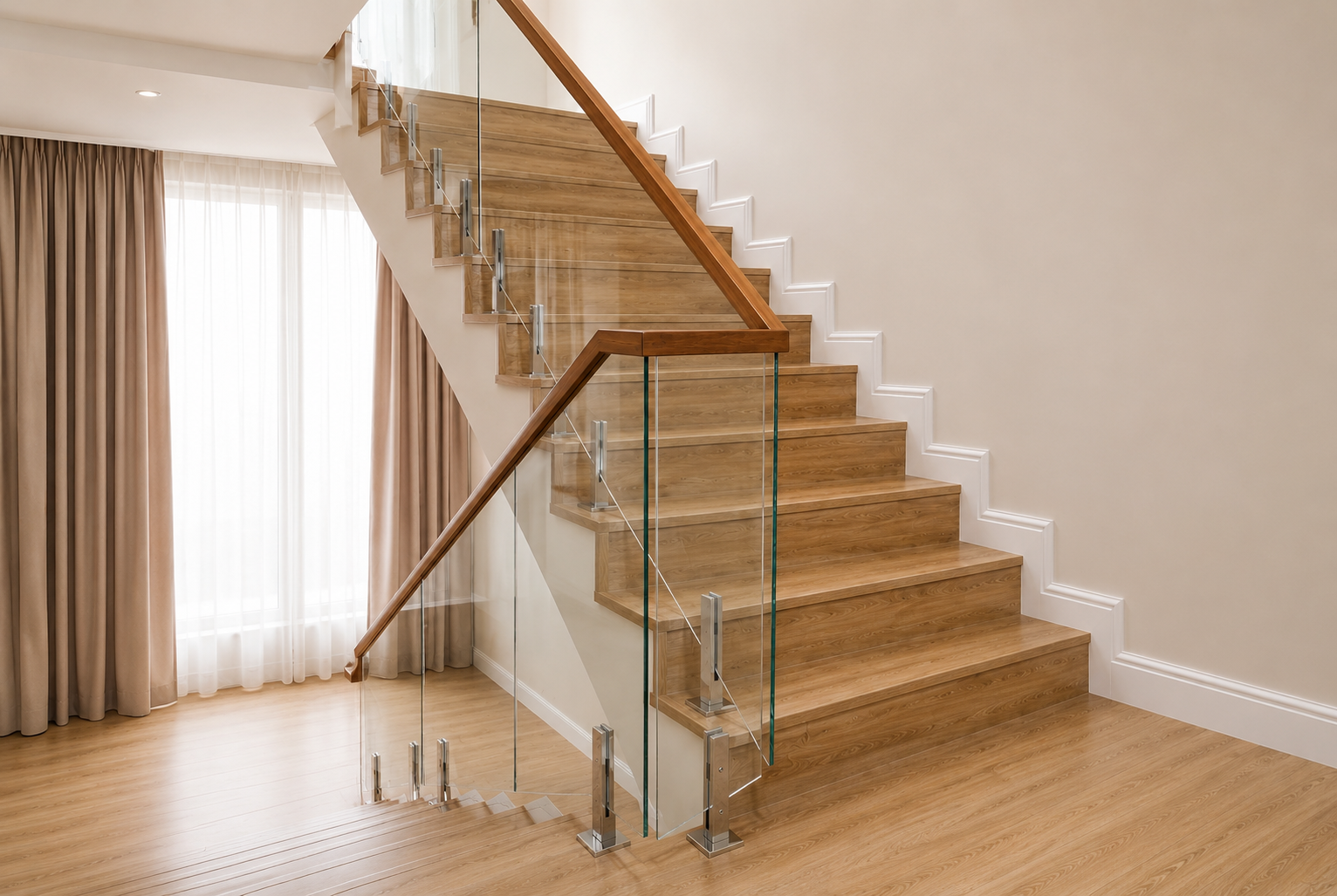Glass Staircase Balustrade Dubai Glass staircase balustrade with stainless steel fittings and wooden handrail for a modern villa interior in Dubai by Glass Sea Trading L.L.C.